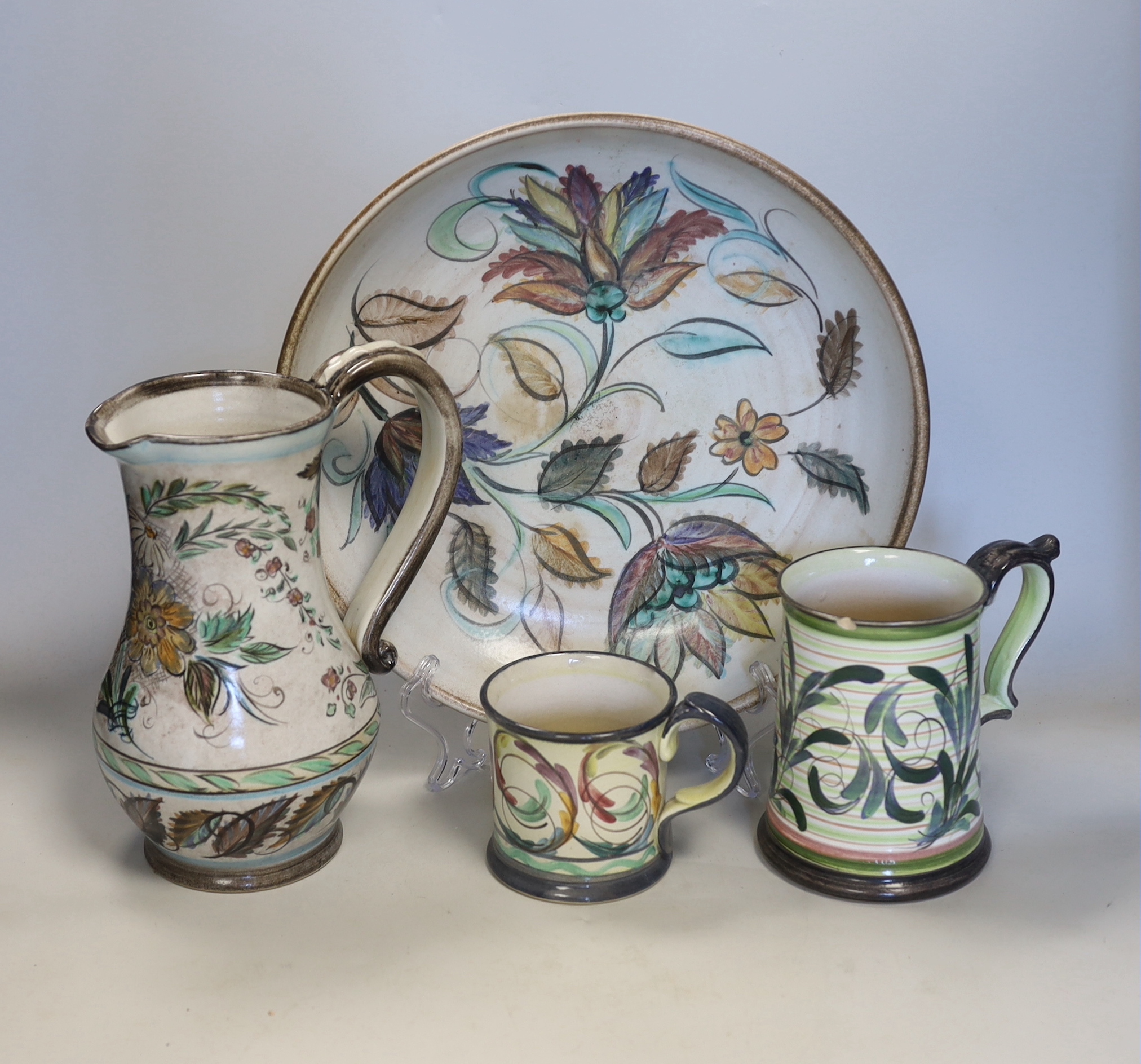 Glyn Colledge pottery - comprising two mugs, jug and bowl, signed to the bases, 31cm in diameter